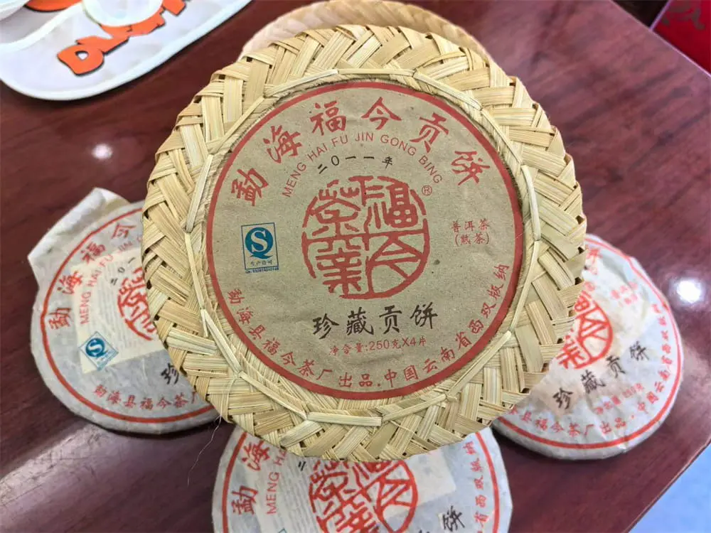 西双版纳回收福今普洱茶2011年生茶熟茶图2