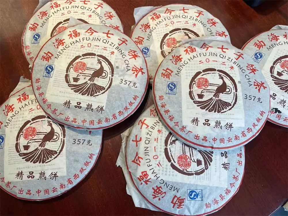 西双版纳回收福今普洱茶2012年生茶熟茶图2