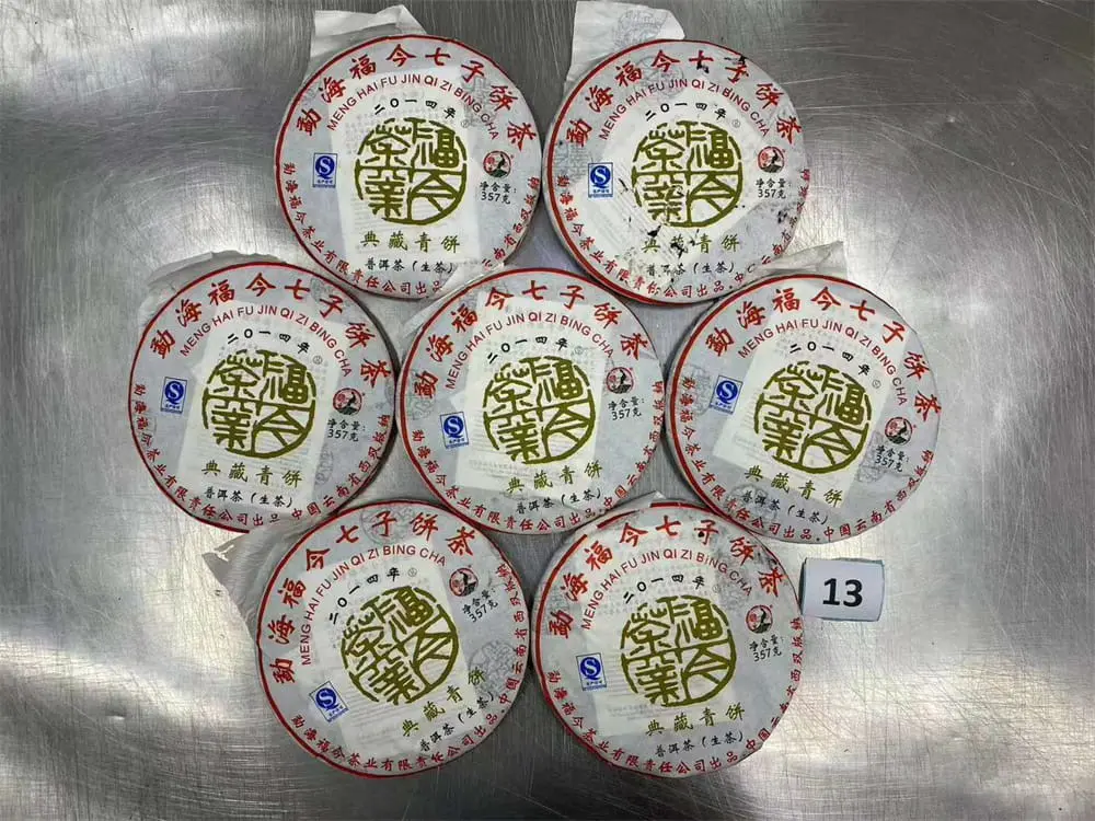 西双版纳回收福今普洱茶2014年生茶熟茶图2